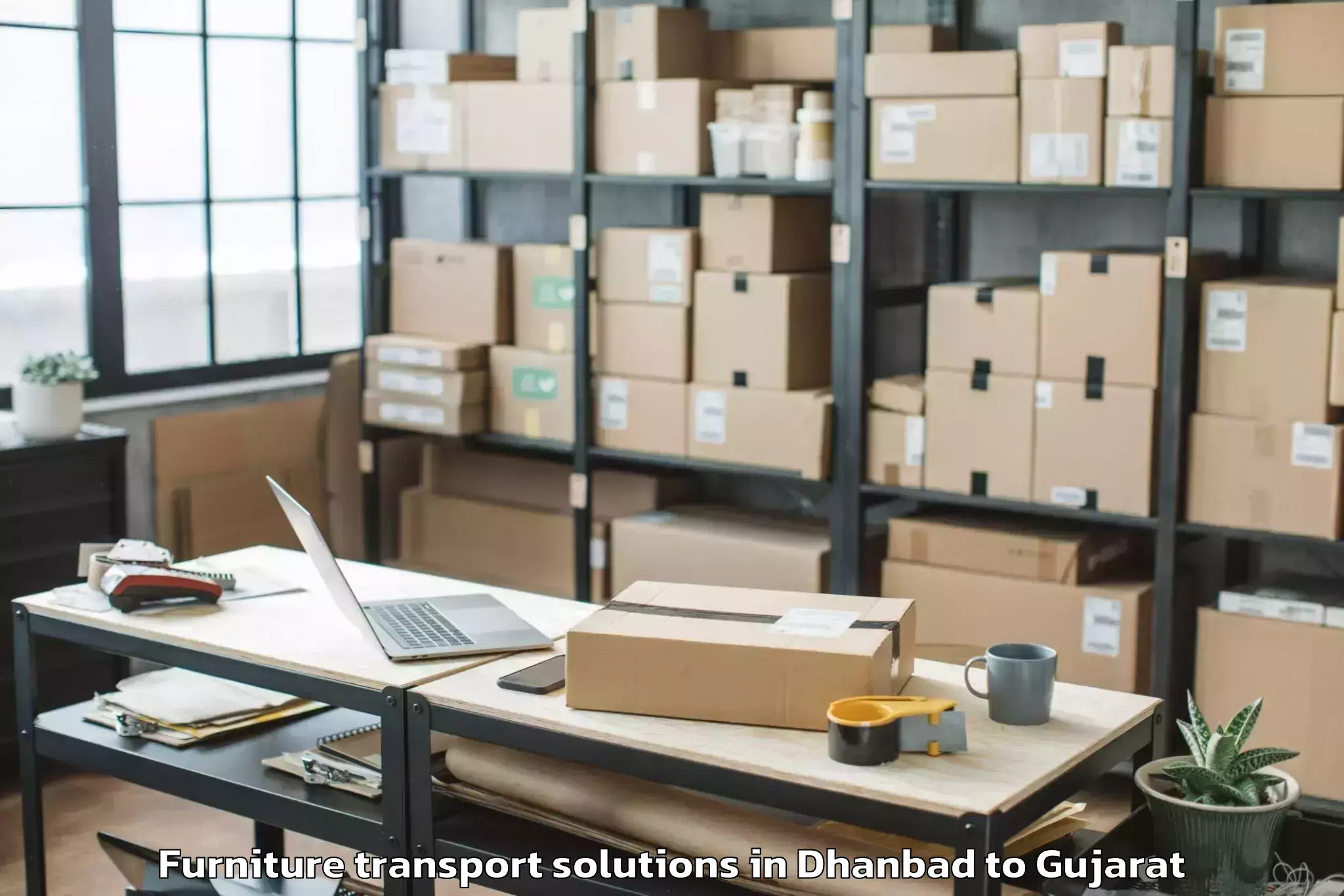 Trusted Dhanbad to Iiit Surat Furniture Transport Solutions